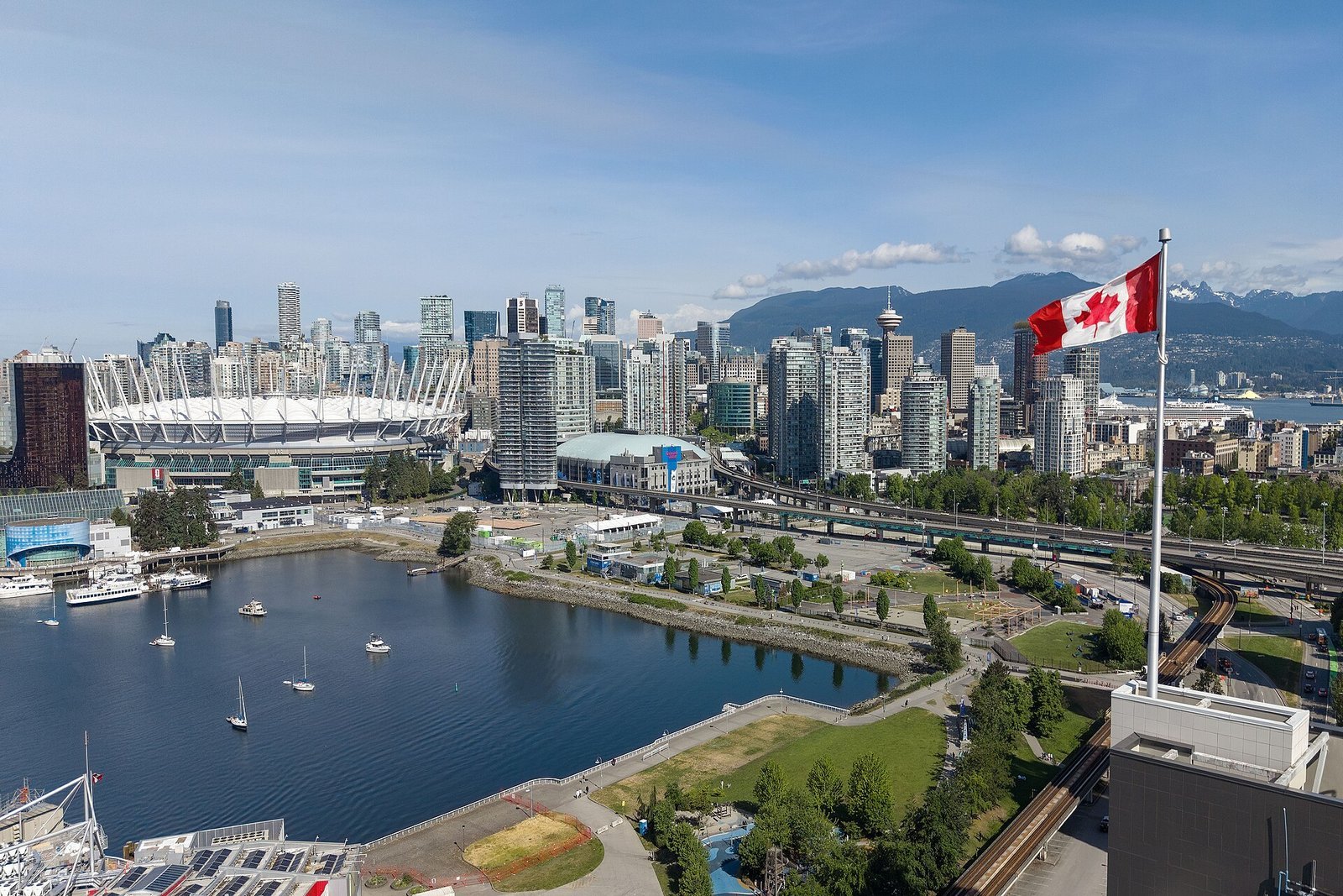 The Vancouver skyline with the Coastal Mountains rising behind the harbour